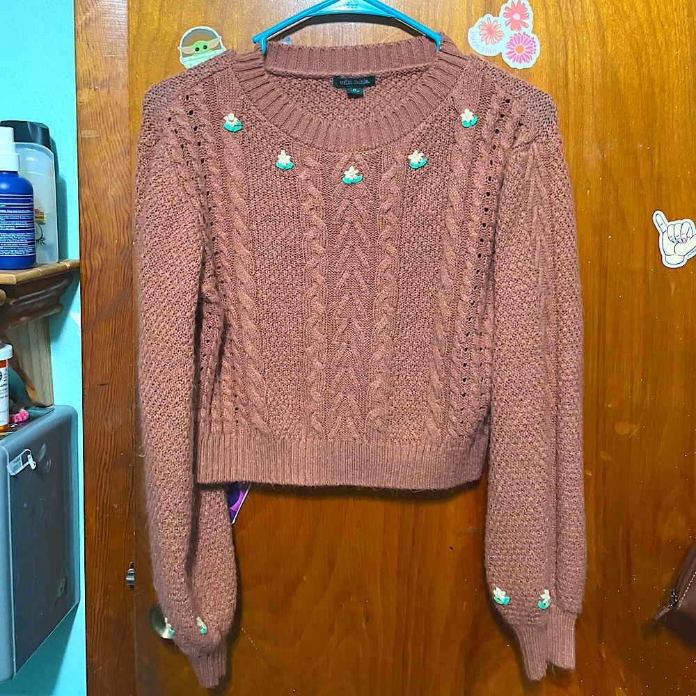 Sweater brown yellow flowers around its neck line